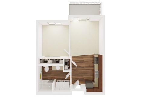 A white room with a bed and a desk.